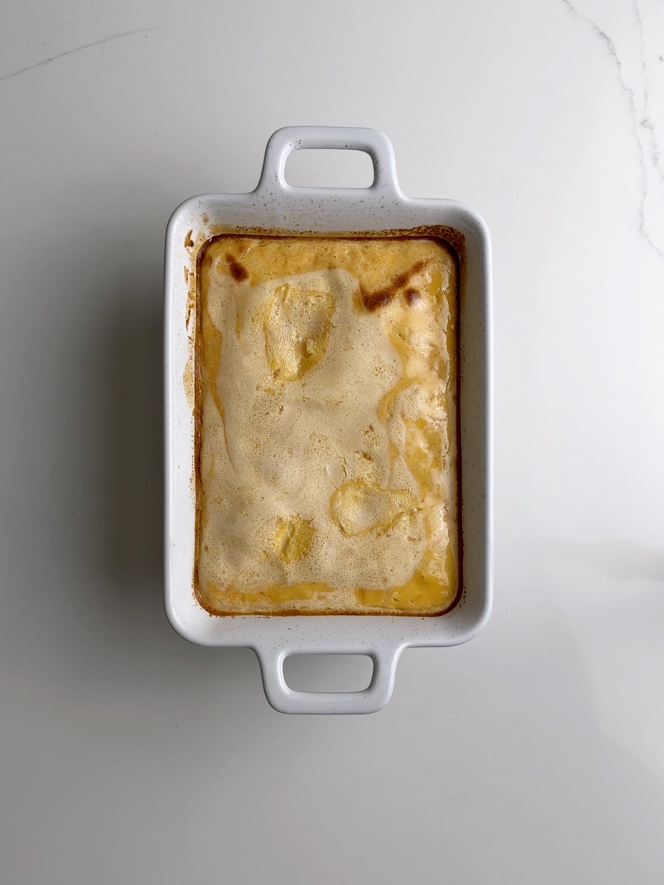 Finished baked custard on a white counter. 