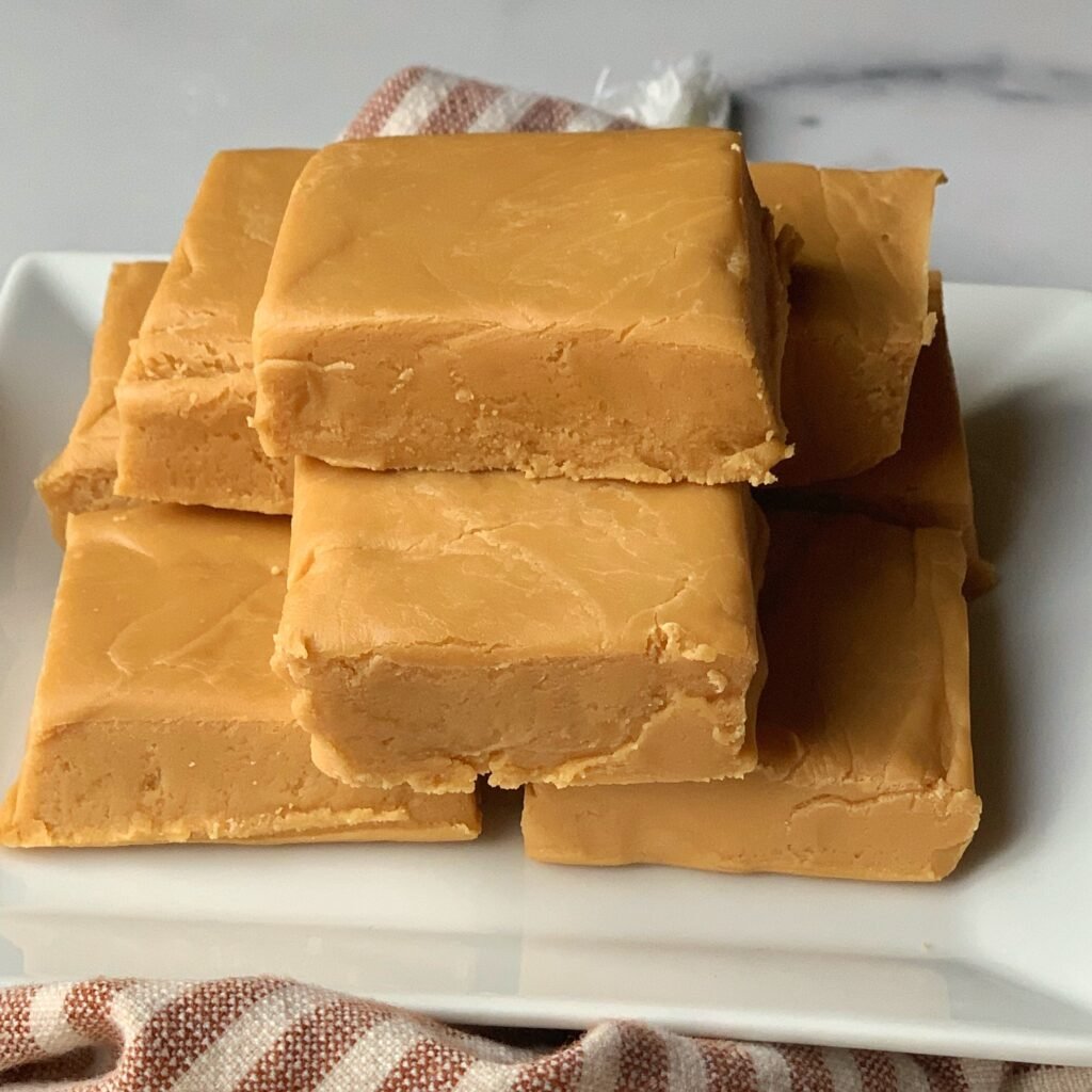 bars of vanilla fudge stacked on a plate