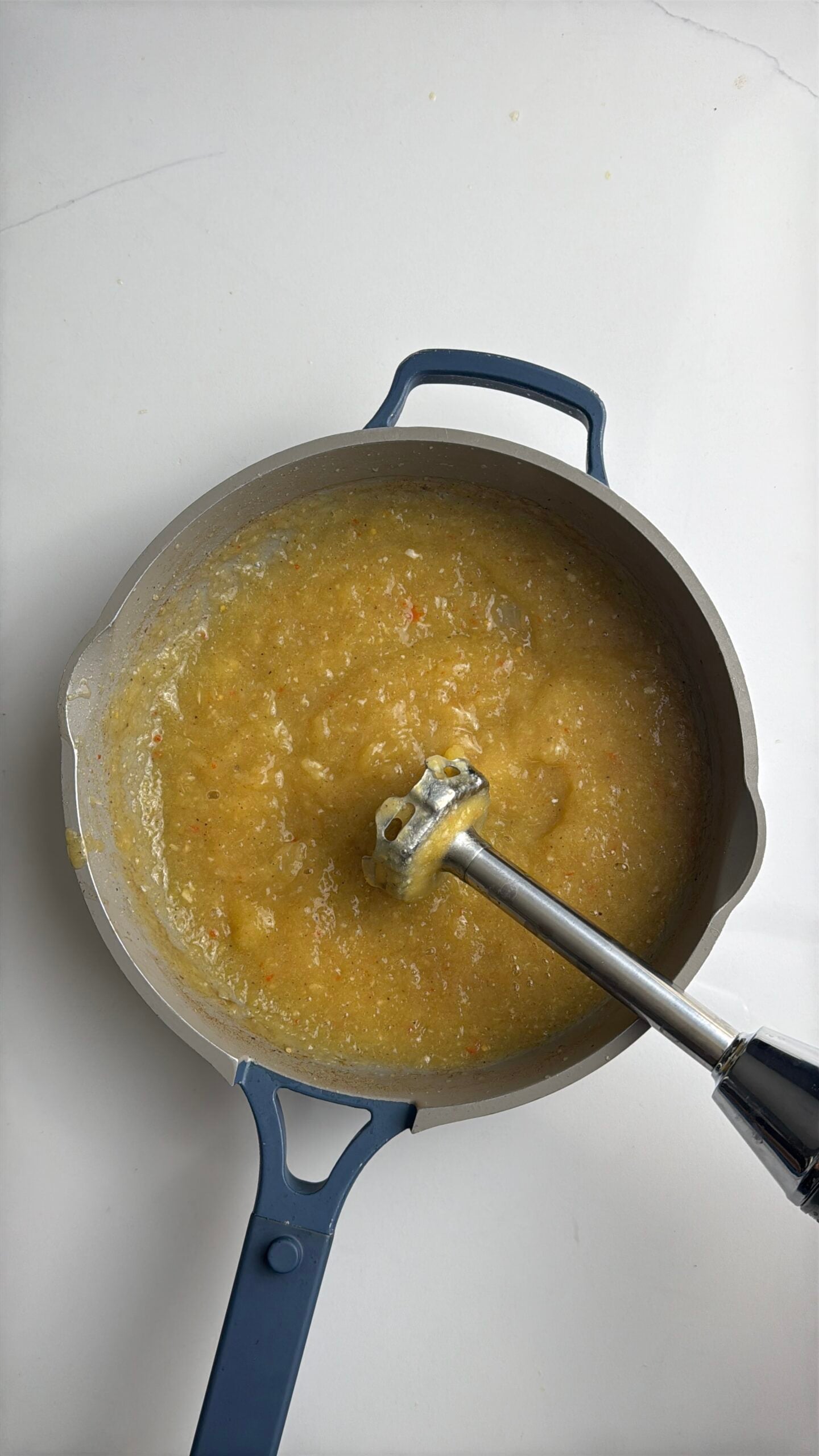 Blending Mango Sour Until Smooth