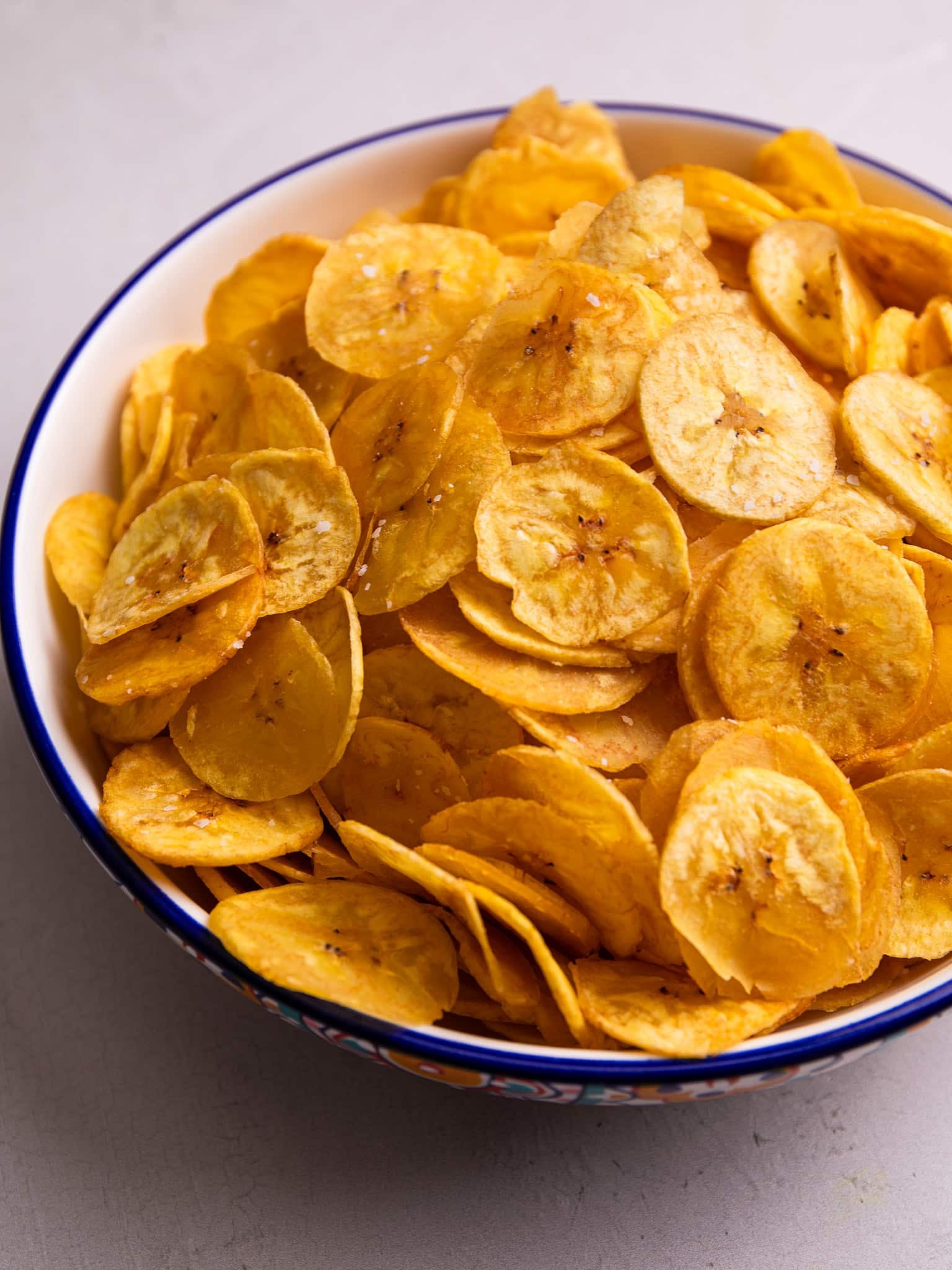 crispy homemade plantain chips served in a bowl