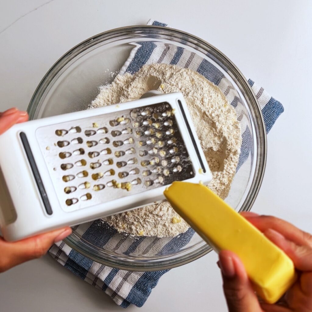grating butter on a box grater