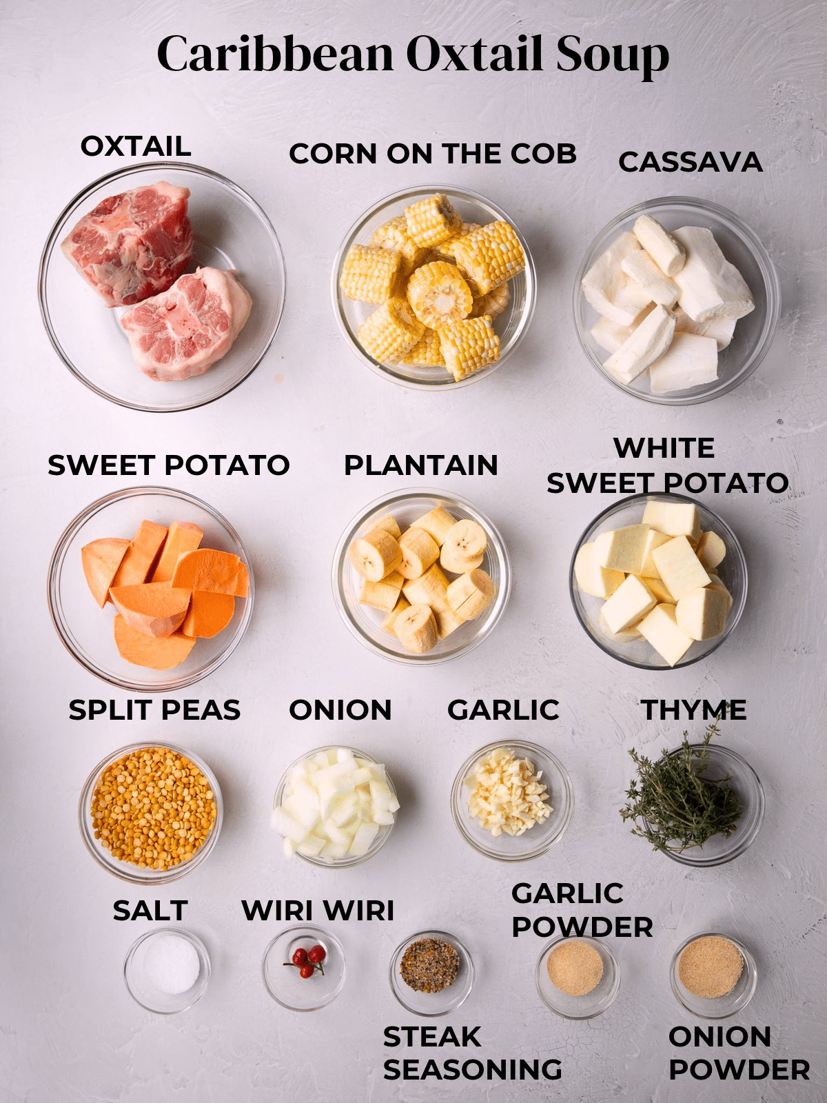 Labeled ingredients for Caribbean oxtail soup, including oxtail, corn, cassava, sweet potatoes, plantain, split peas, and seasonings.