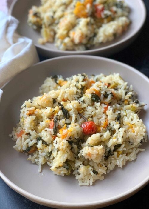 Callaloo cook up on a grey plate