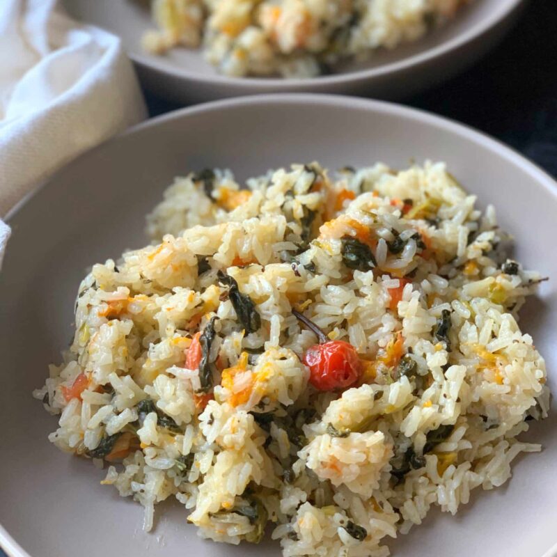 Callaloo cook up on a grey plate