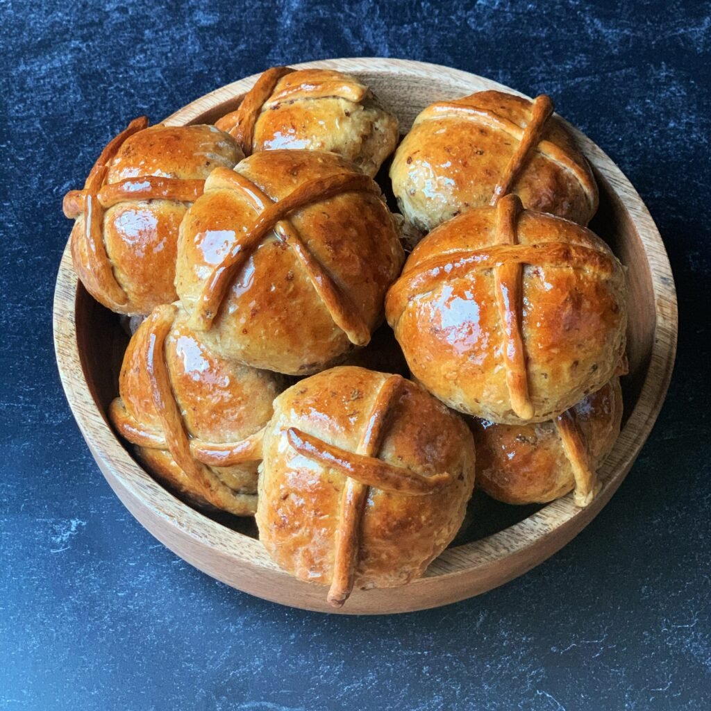 a basket full of Guyanese hot cross buns