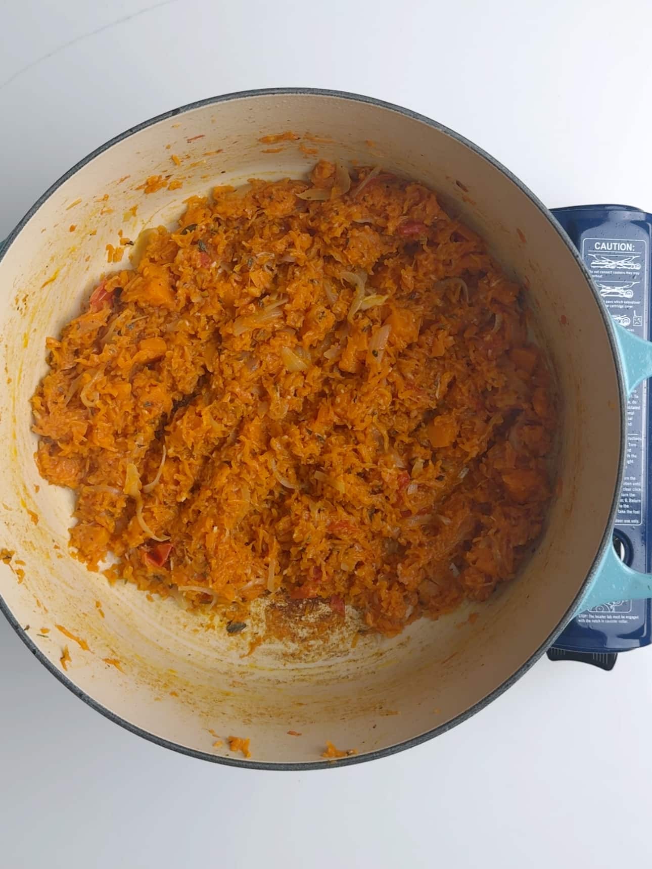 Finished sautéed guyanese pumpkin in a pot.