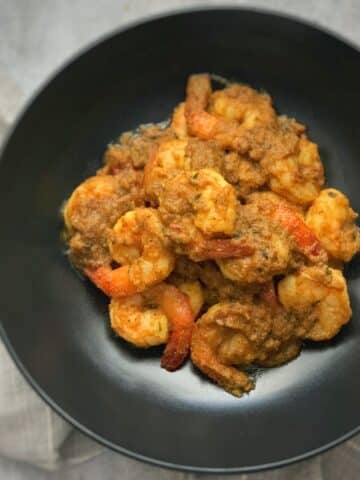 Bunjal Shrimp Curry in a black plate