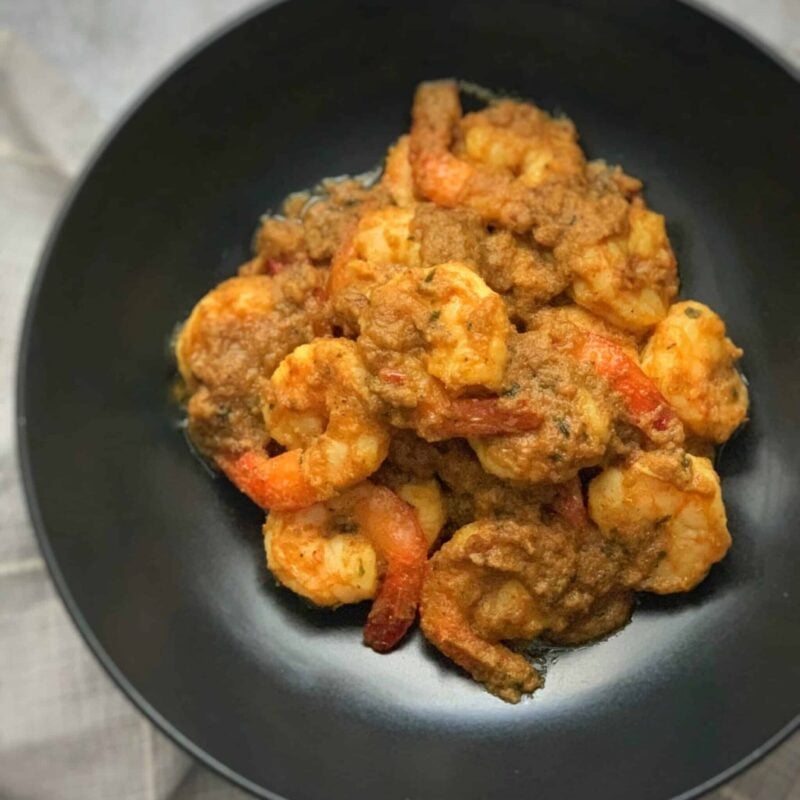 Bunjal Shrimp Curry in a black plate