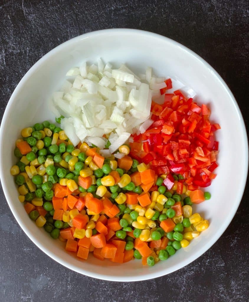 a bowl full of assorted veggies