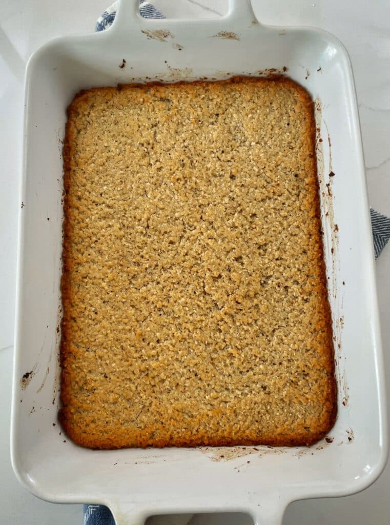 freshly baked cassava pone in a baking dish