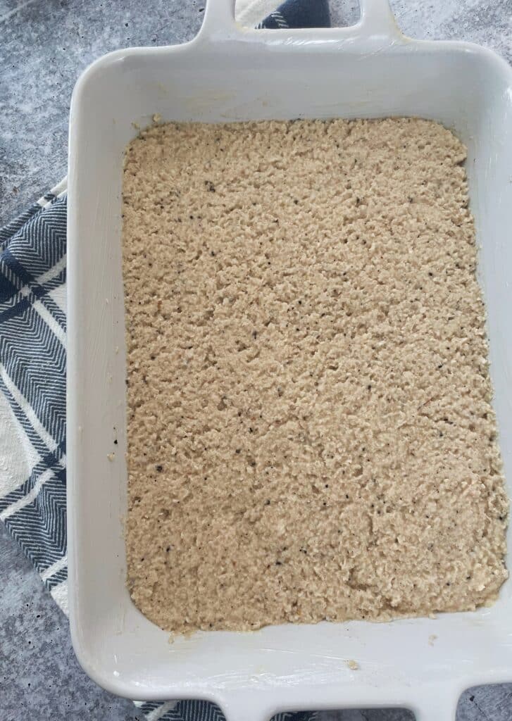cassava pone in a baking dish before it is baked