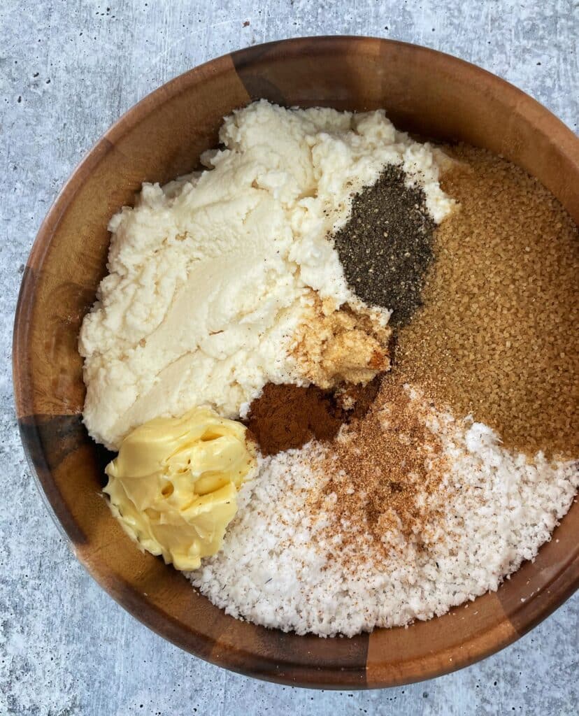 a bowl of the ingredients needed for cassava pone