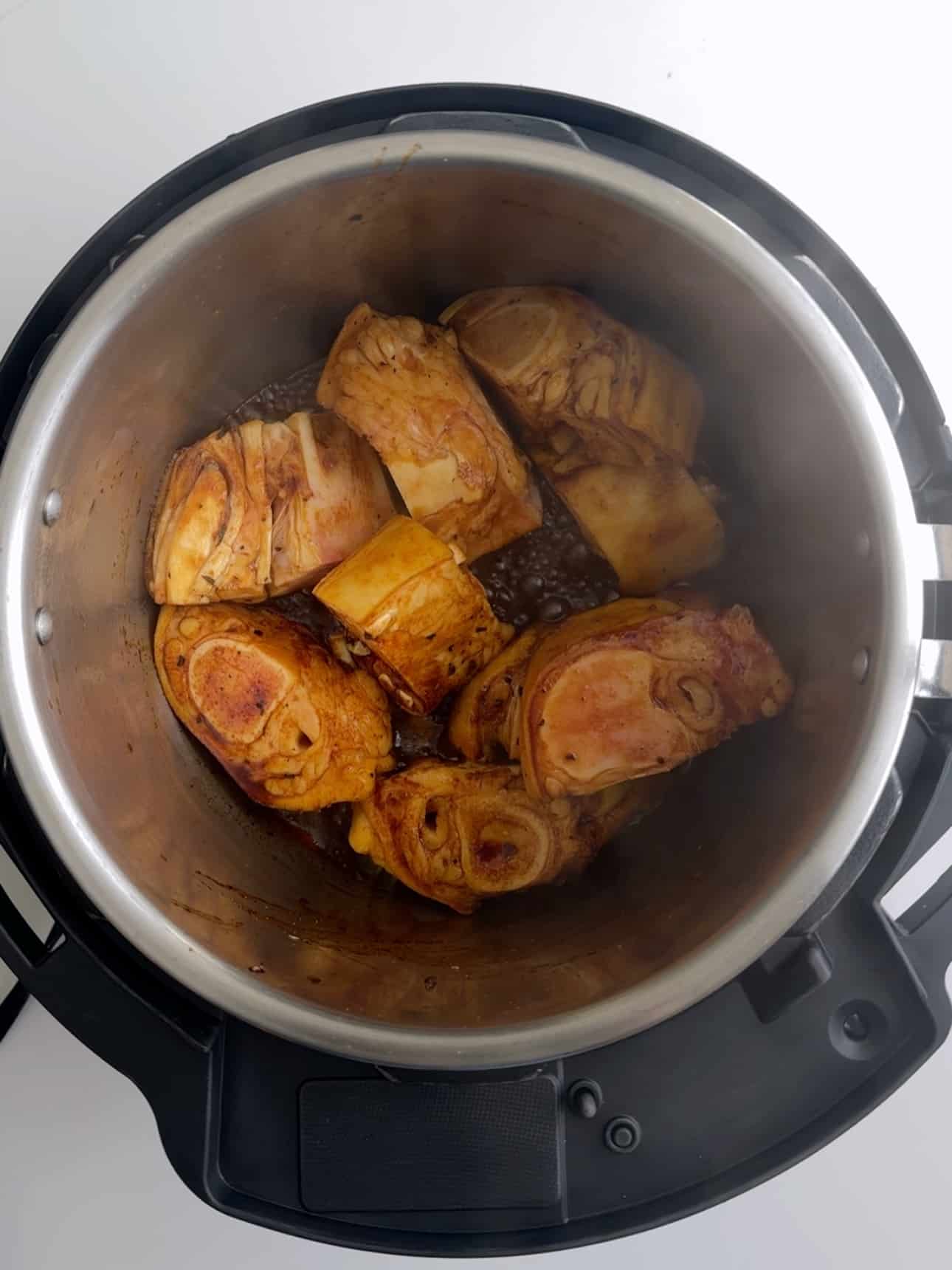 Cow Heel or beef feet in a instant pot before pressure cooking