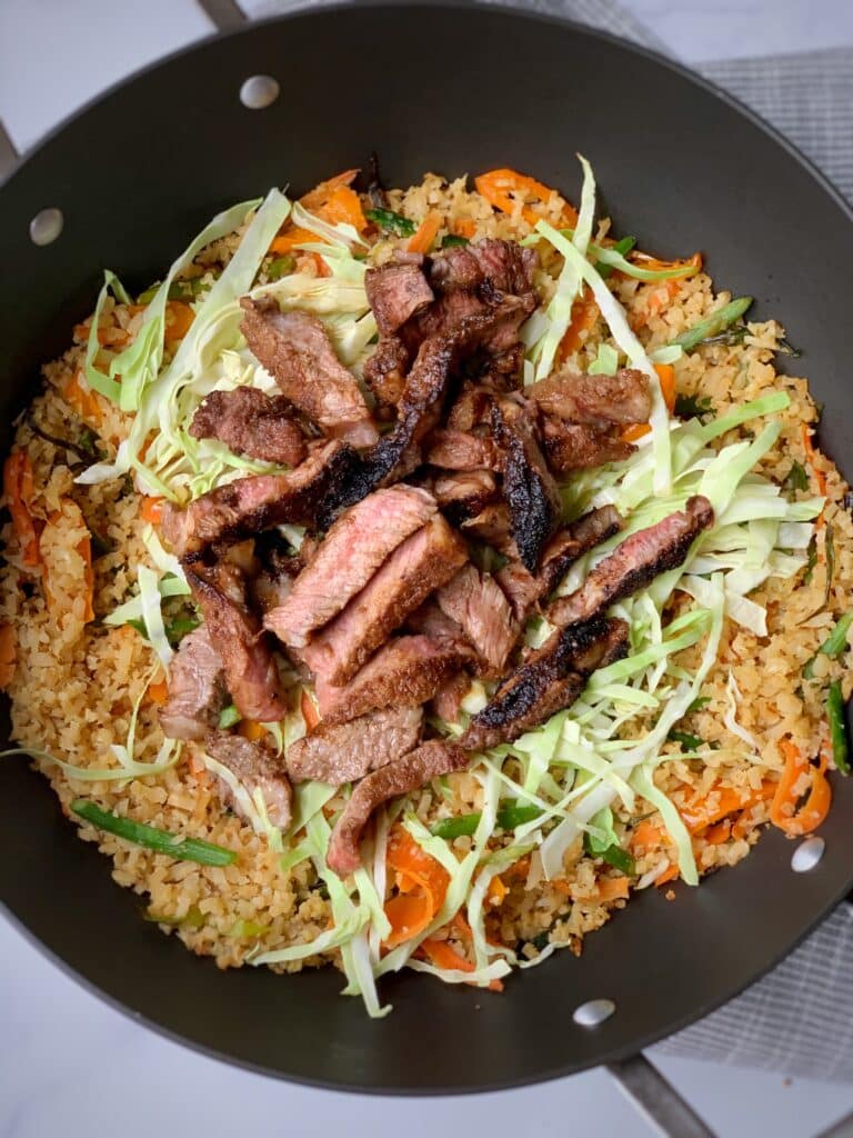 steak fried rice in a wok