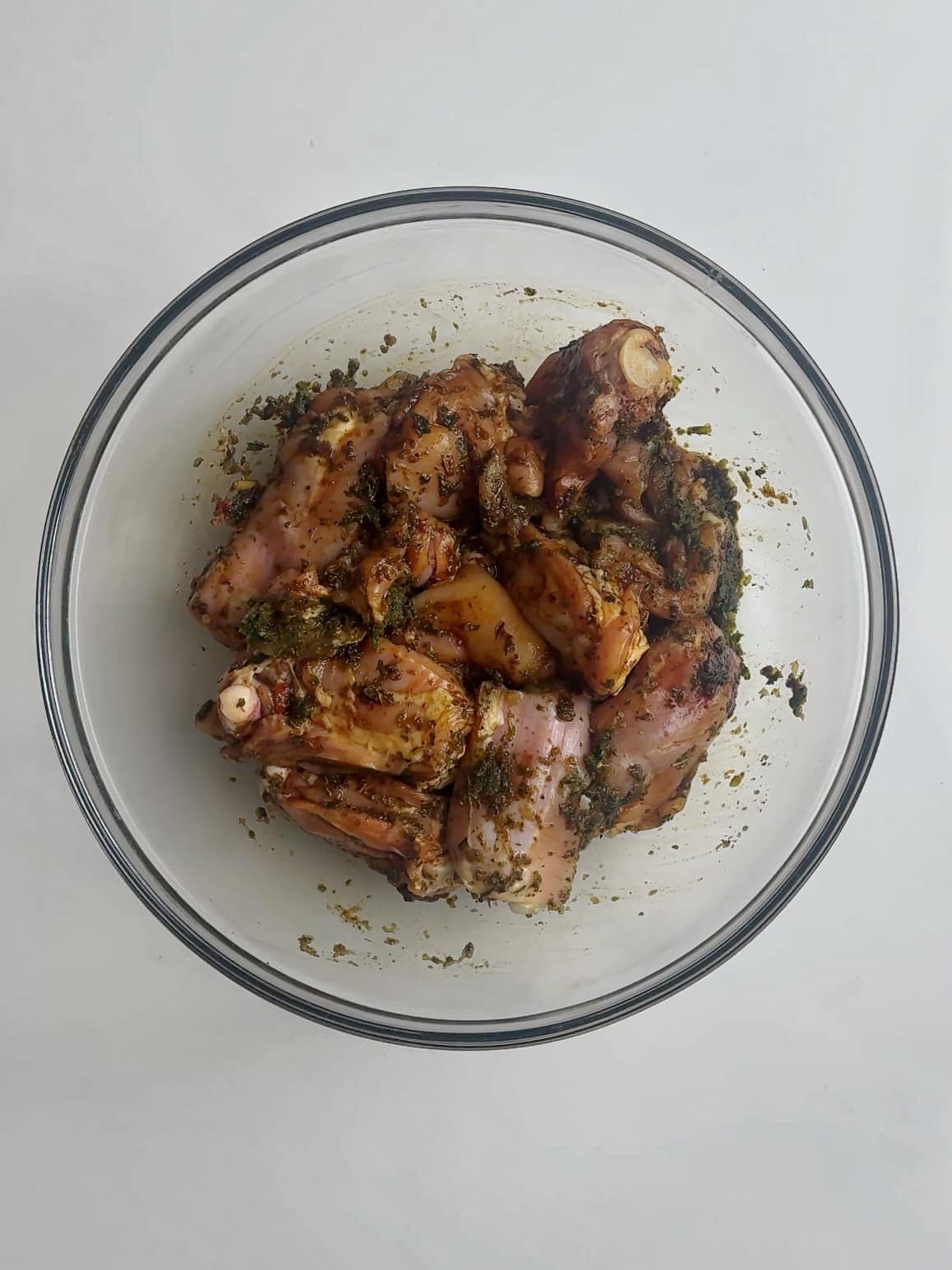 Chicken thighs marinating for Guyanese chicken stew. 