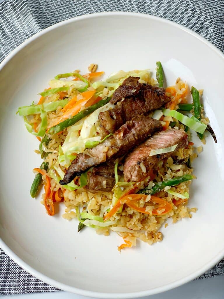 plated steak fried rice