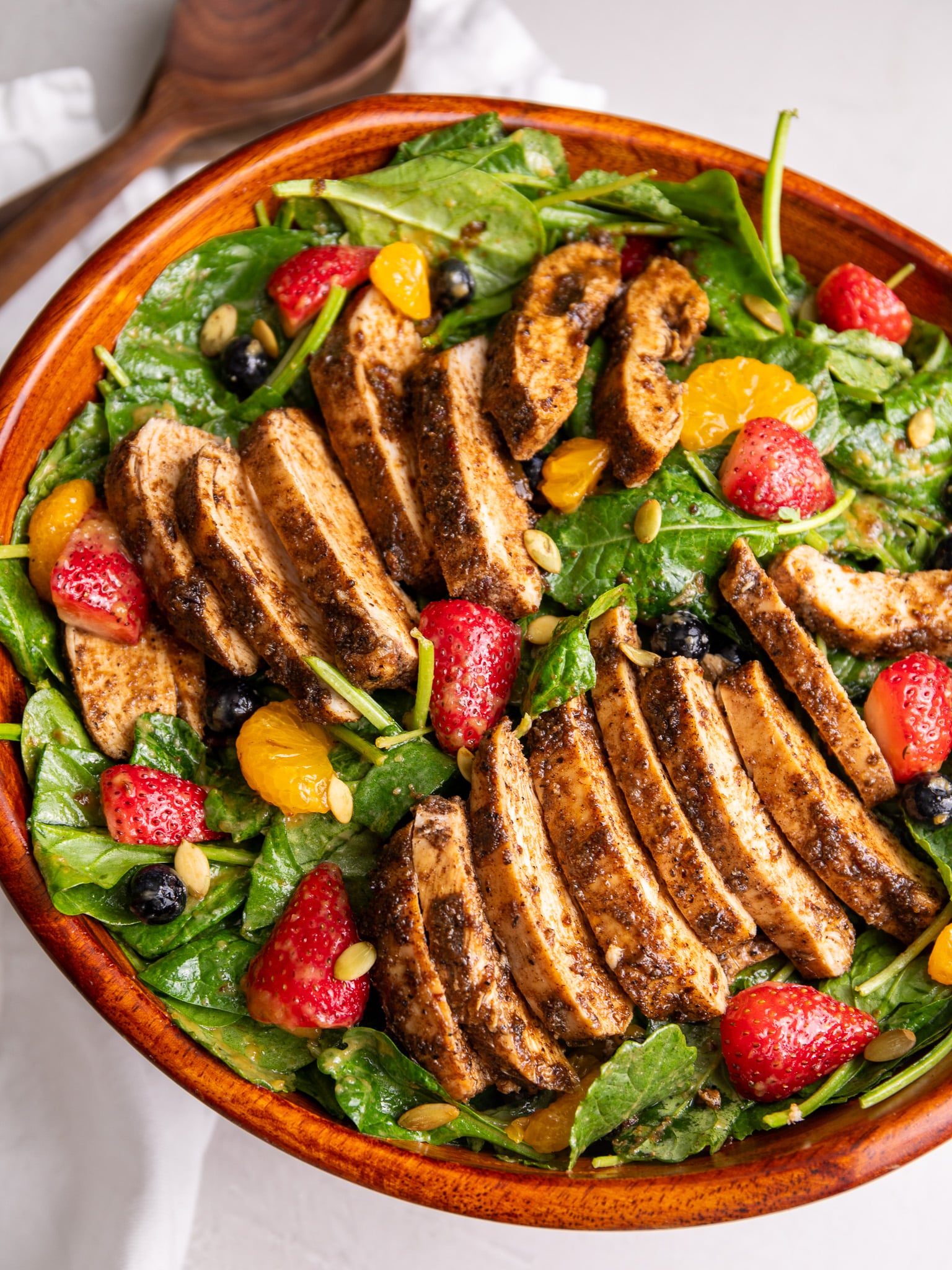 jerk chicken salad with berries and caramelized onion dressing