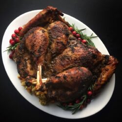 Roasted Jerk Turkey on a platter ready for Thanksgiving