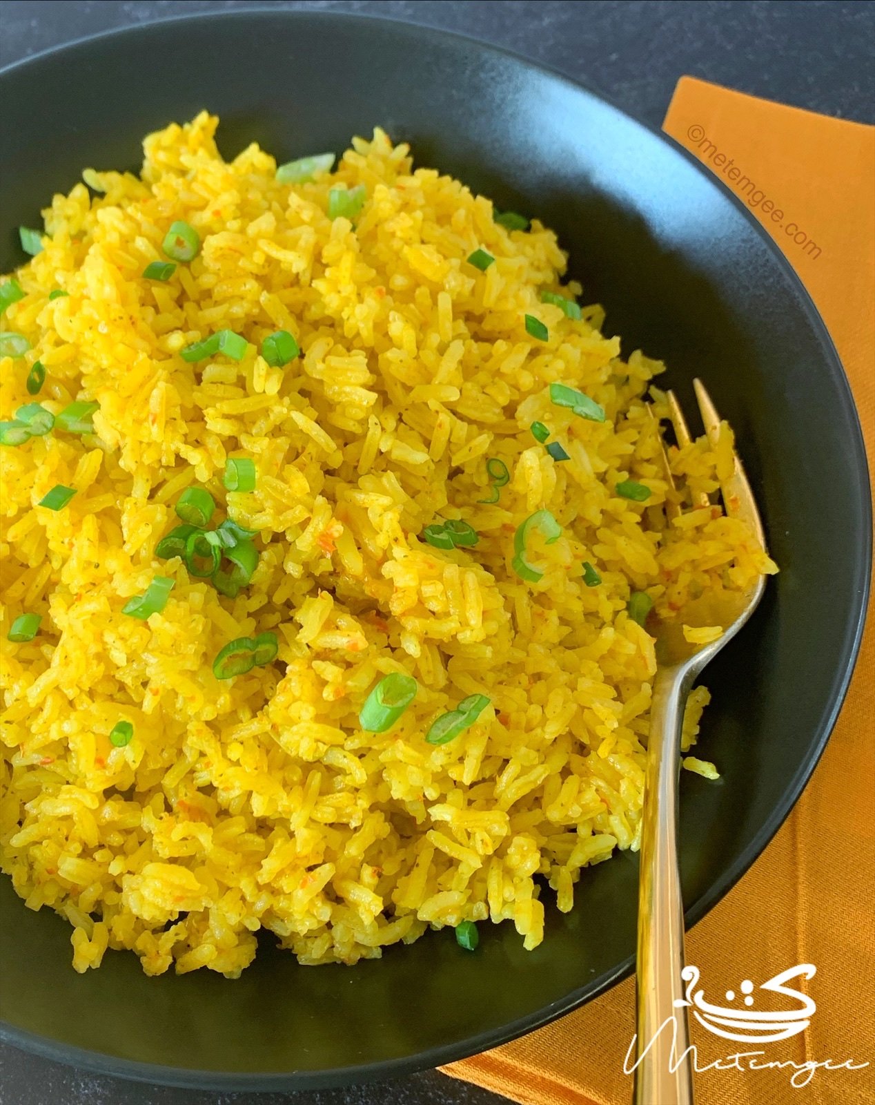 close up view of a bowl of yellow rice