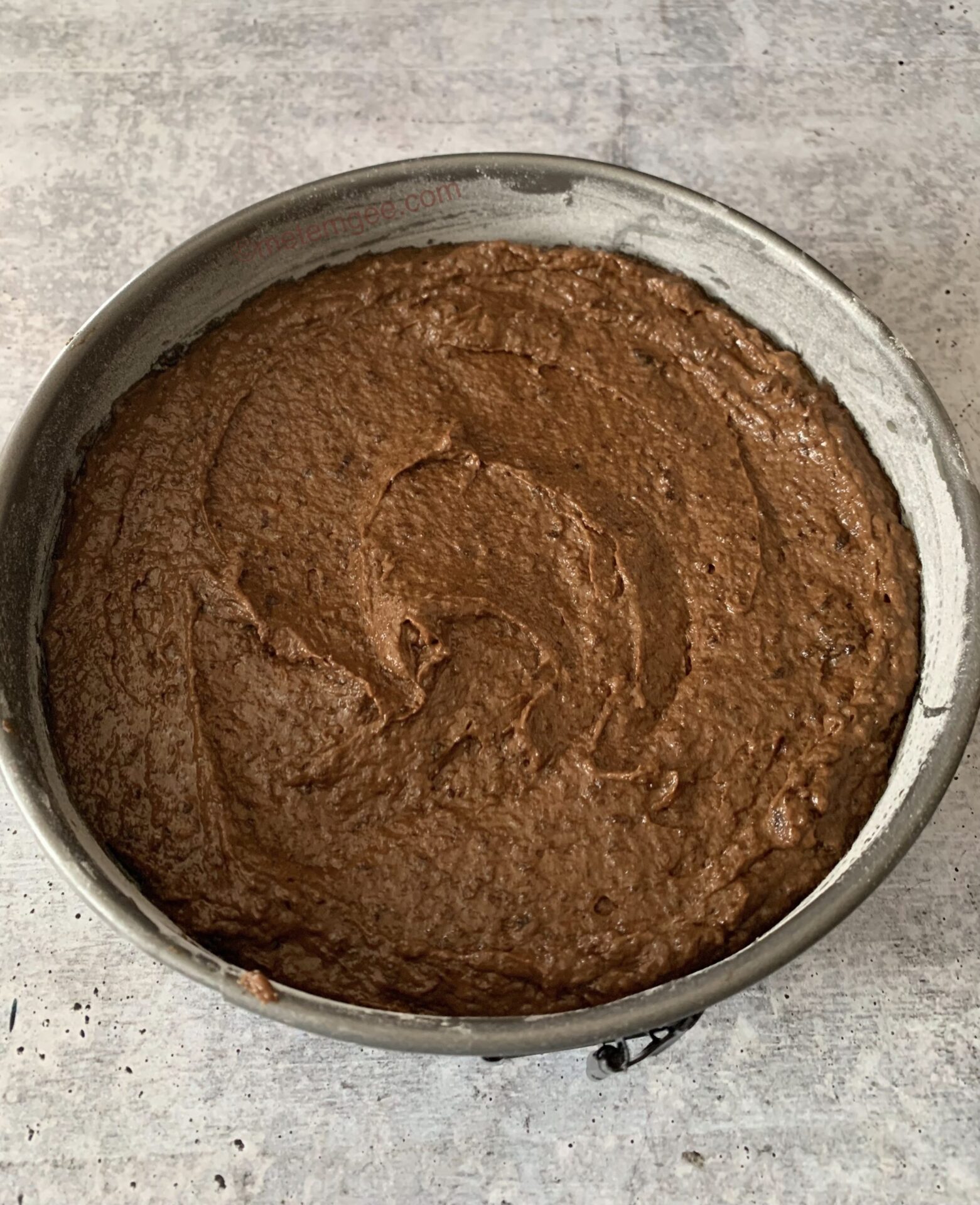 Guyanese black cake batter in a pan