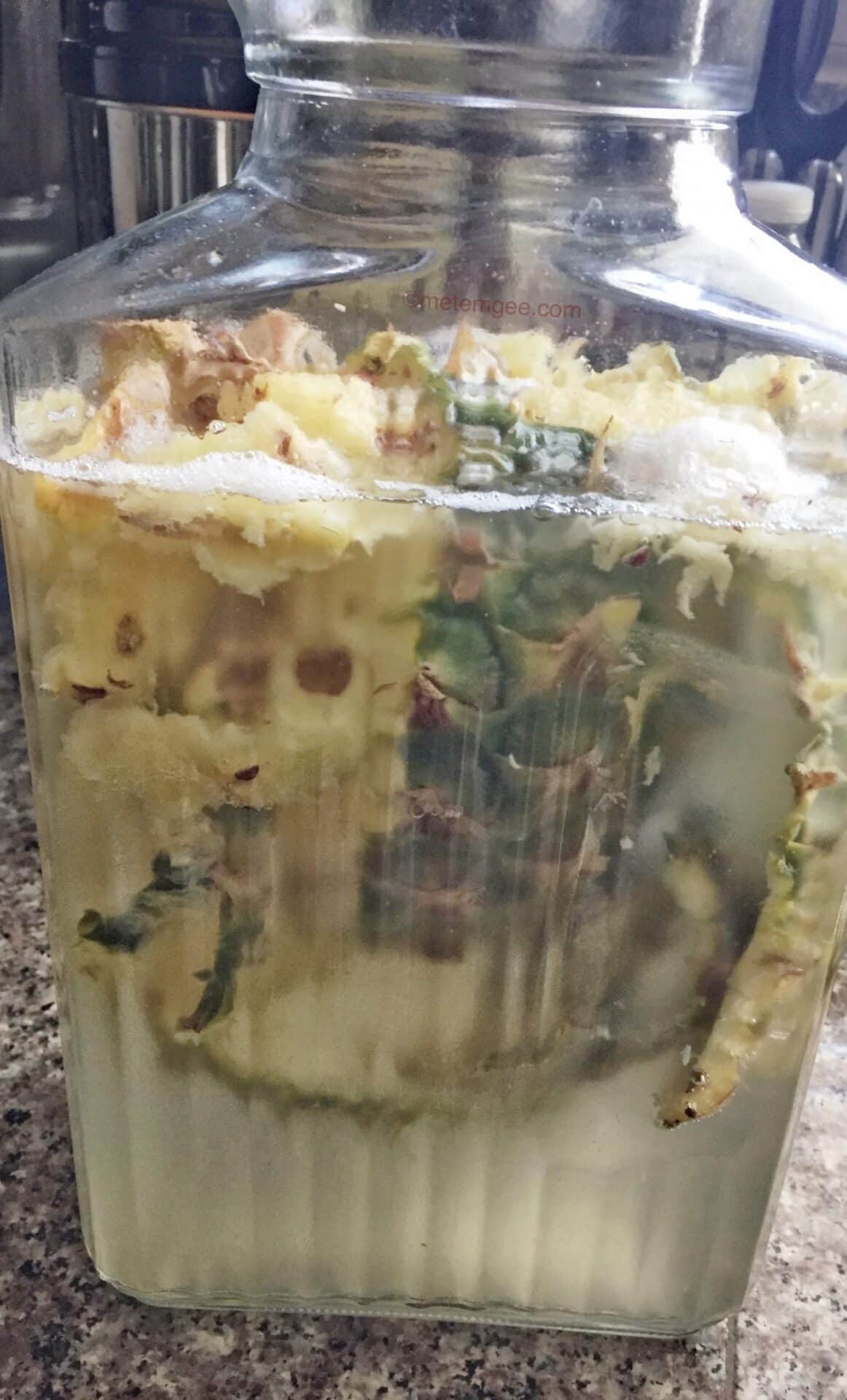 pineapple skin fermenting in water