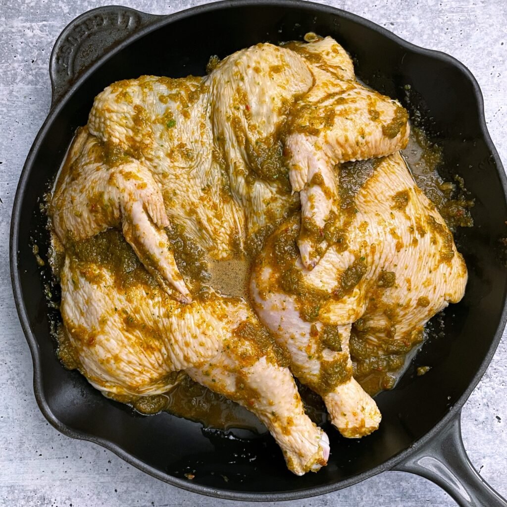 Caribbean roasted chicken in a skillet