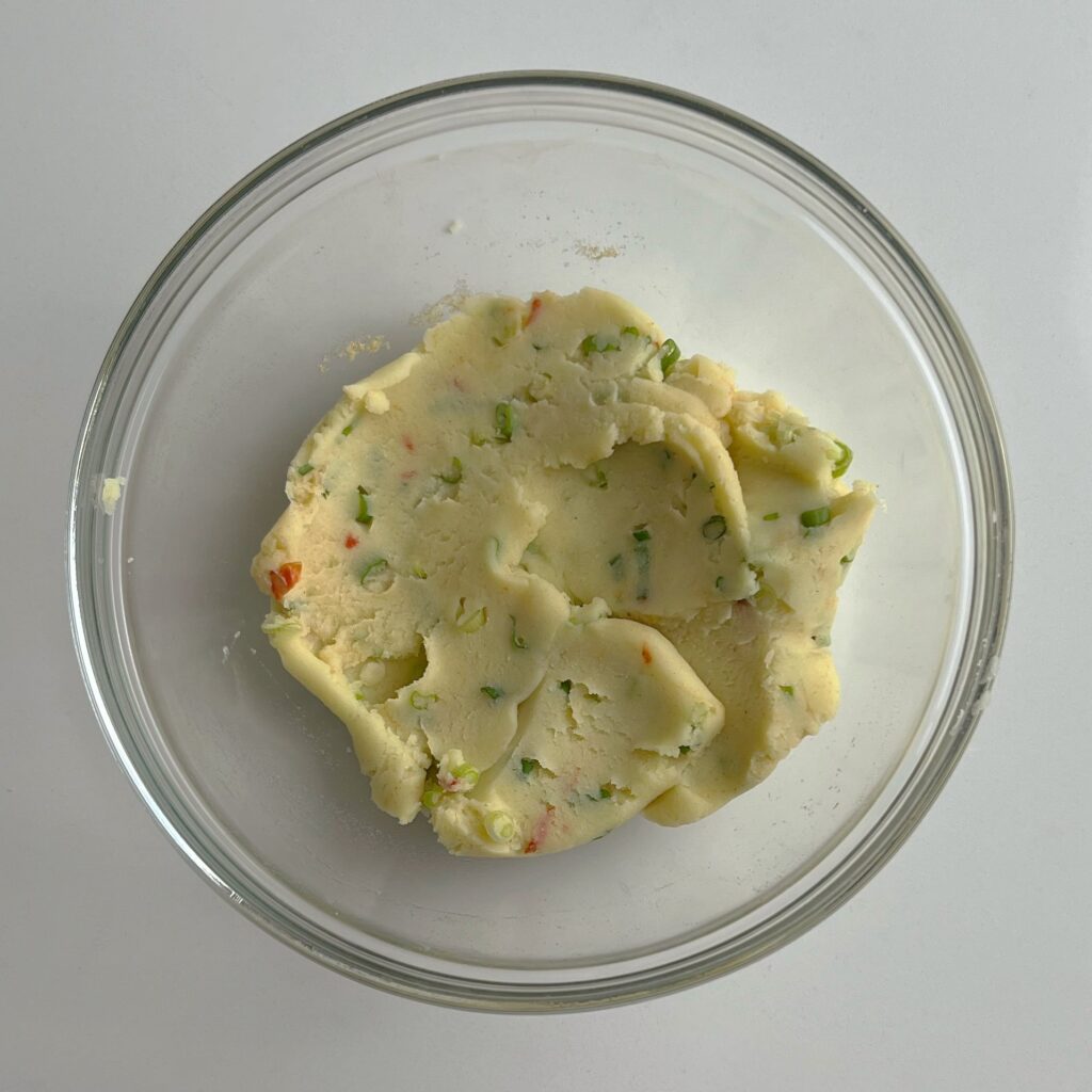 seasoned mashed potato filling in a bowl