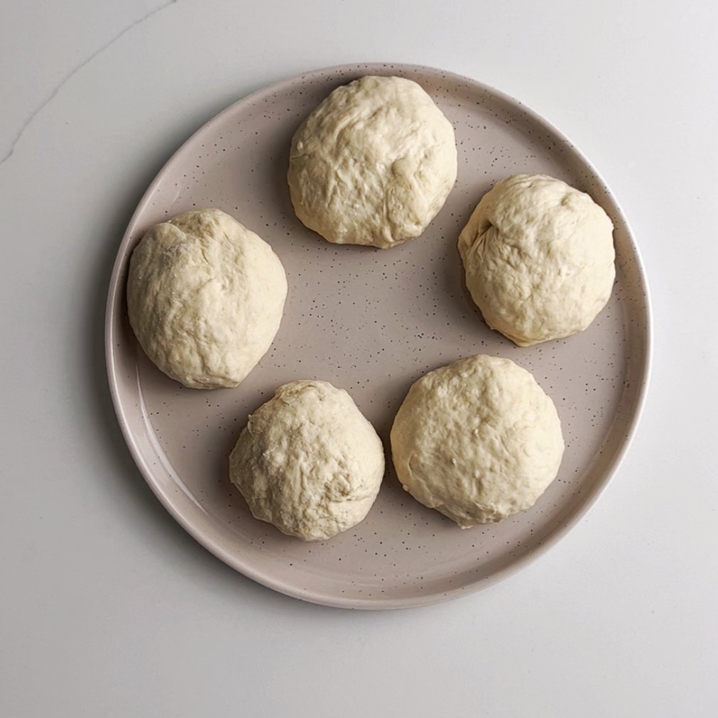 overhead view of five dough balls