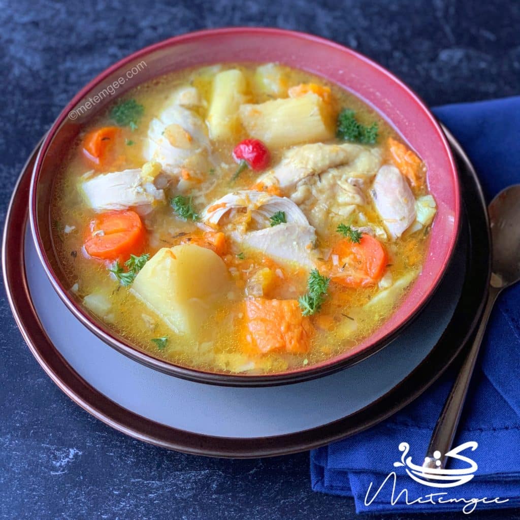 a bowl of chicken and root vegetable soup