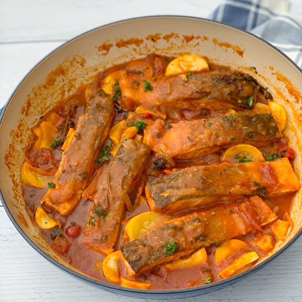 a pot full of fish stew