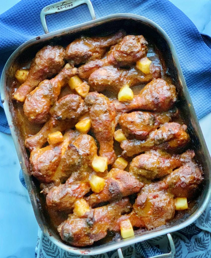 a tray full of pineapple bbq chicken