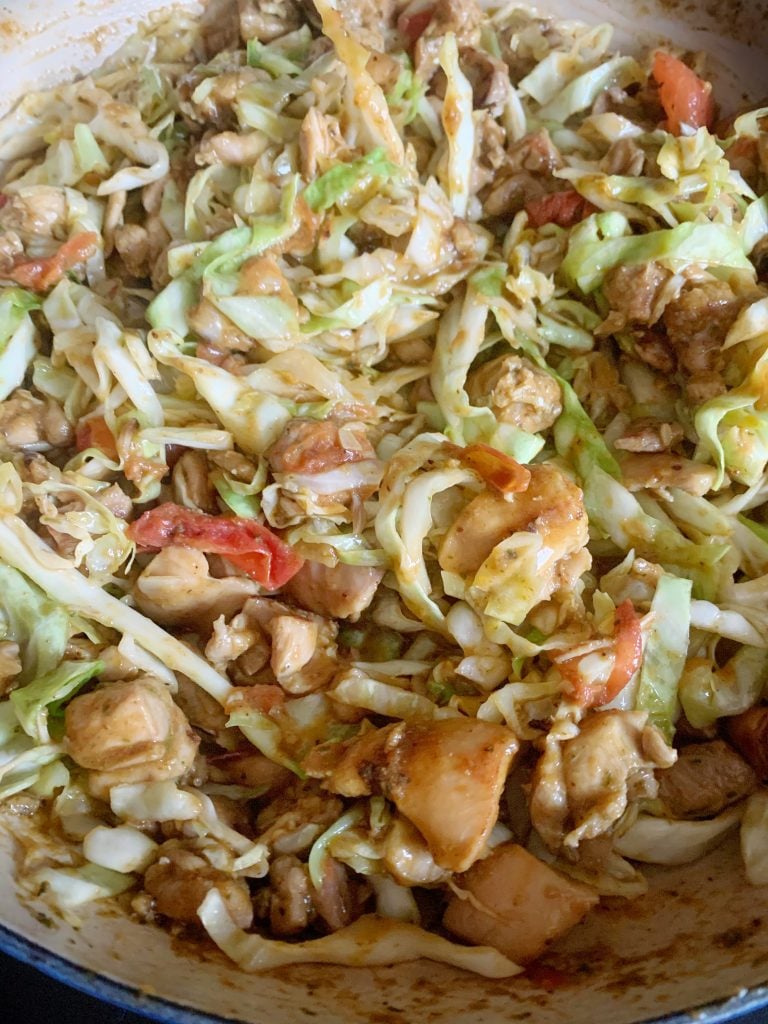 close up view of chicken and cabbage stir fry
