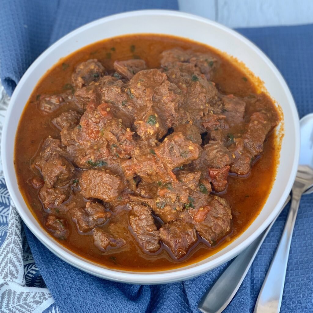 a bowl full of beef stew