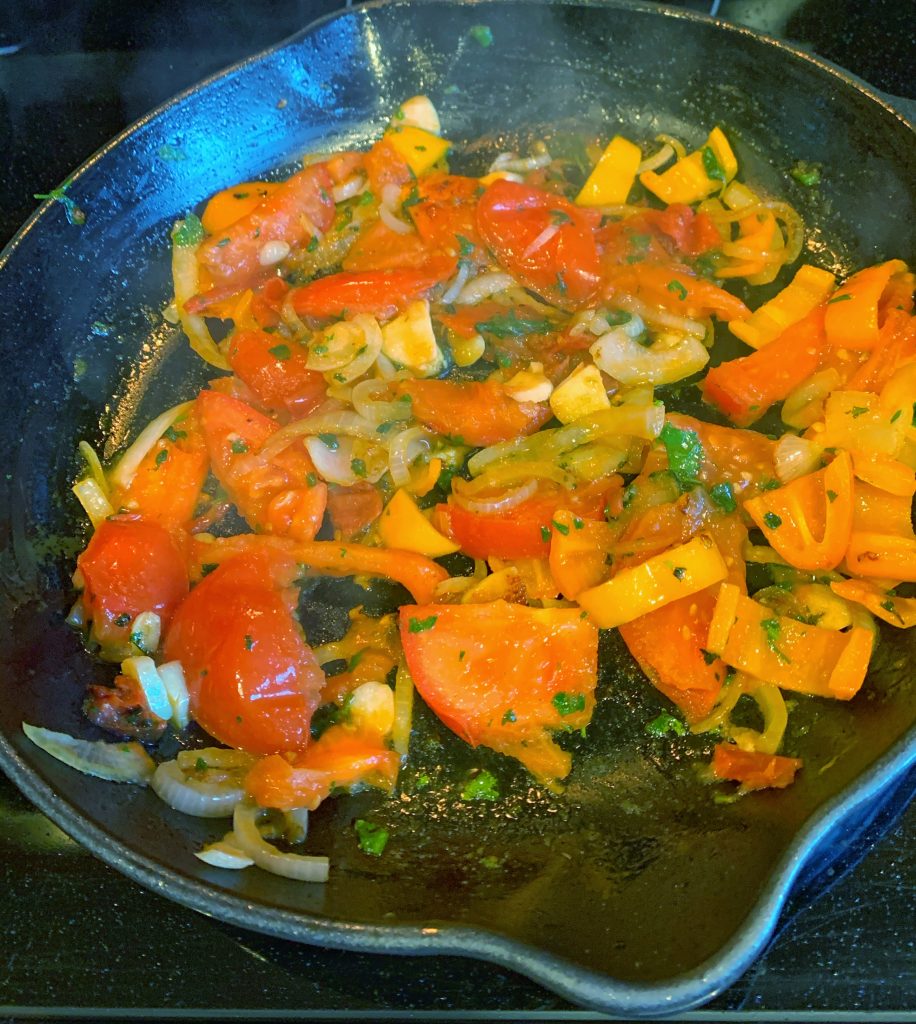 Sautéed vegetables in a skillet