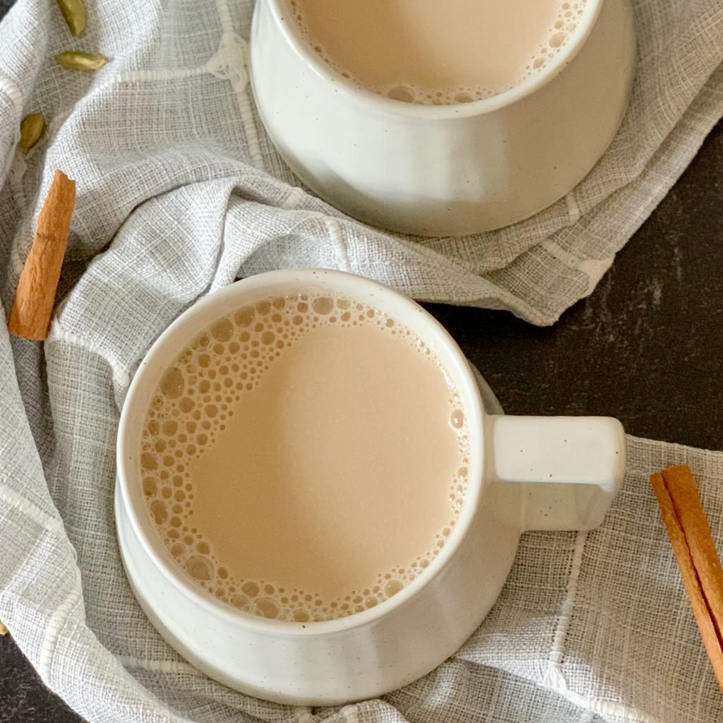 overhead view of two mugs of chai tea