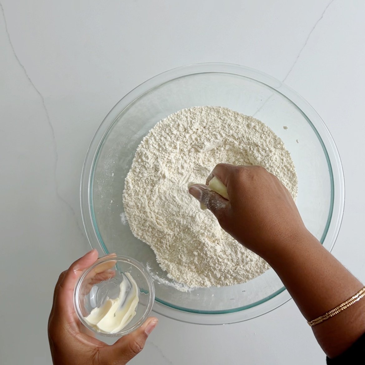 hand in flour mixture