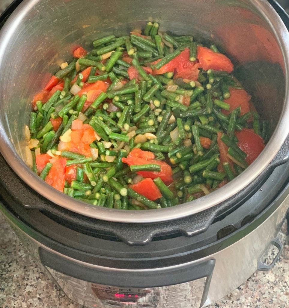 bora and sweet potatoes cooking in an Instant Pot