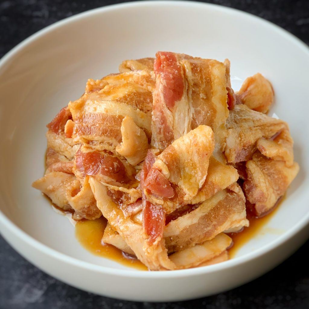 teriyaki glazed bacon strips in a bowl