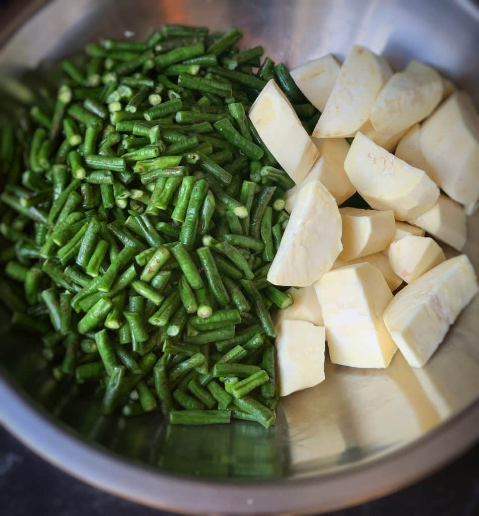 a bowl of chopped bora and diced sweet potatoes