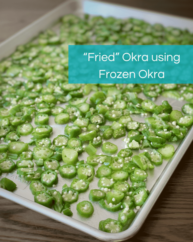 A sheet pan of thinly sliced, defrosted, frozen okras prepped for oven roasting.