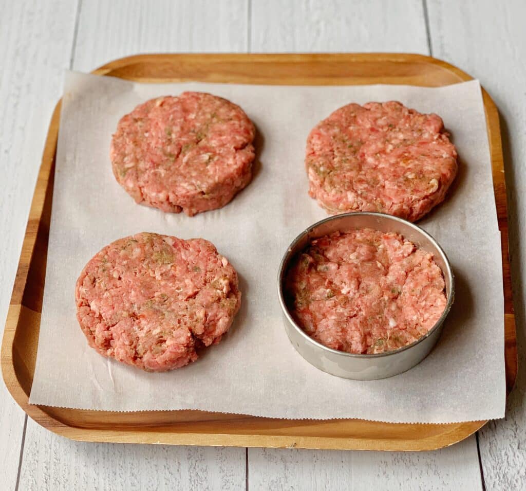 using a hand pie cutter to form burger patties