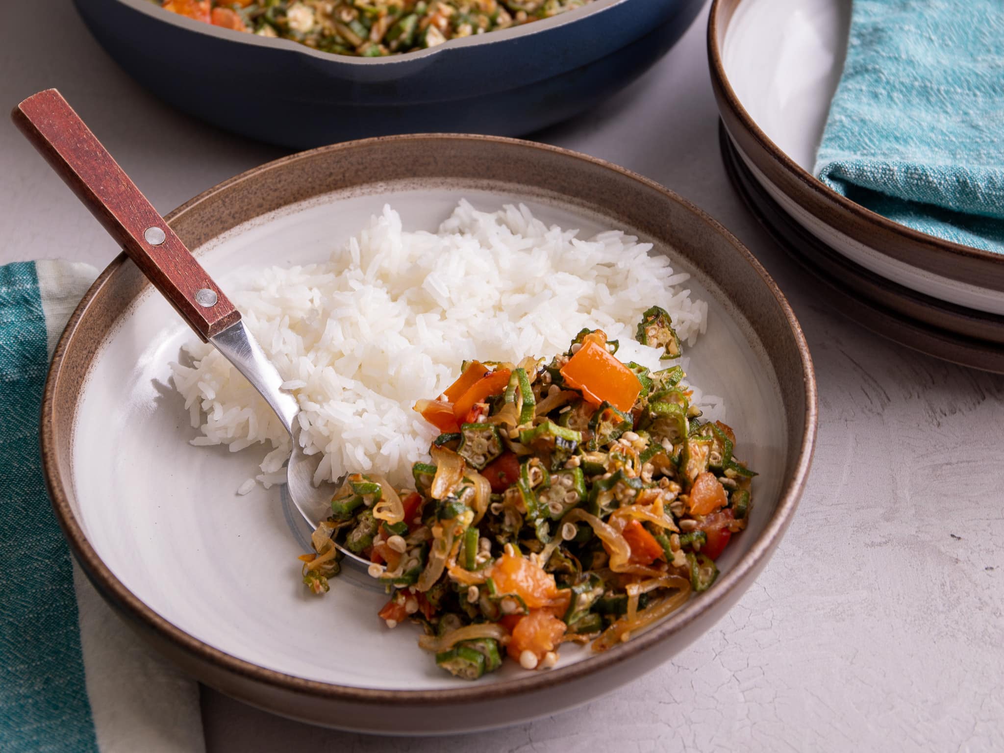 Guyanese fried okra in a bowl with white rice