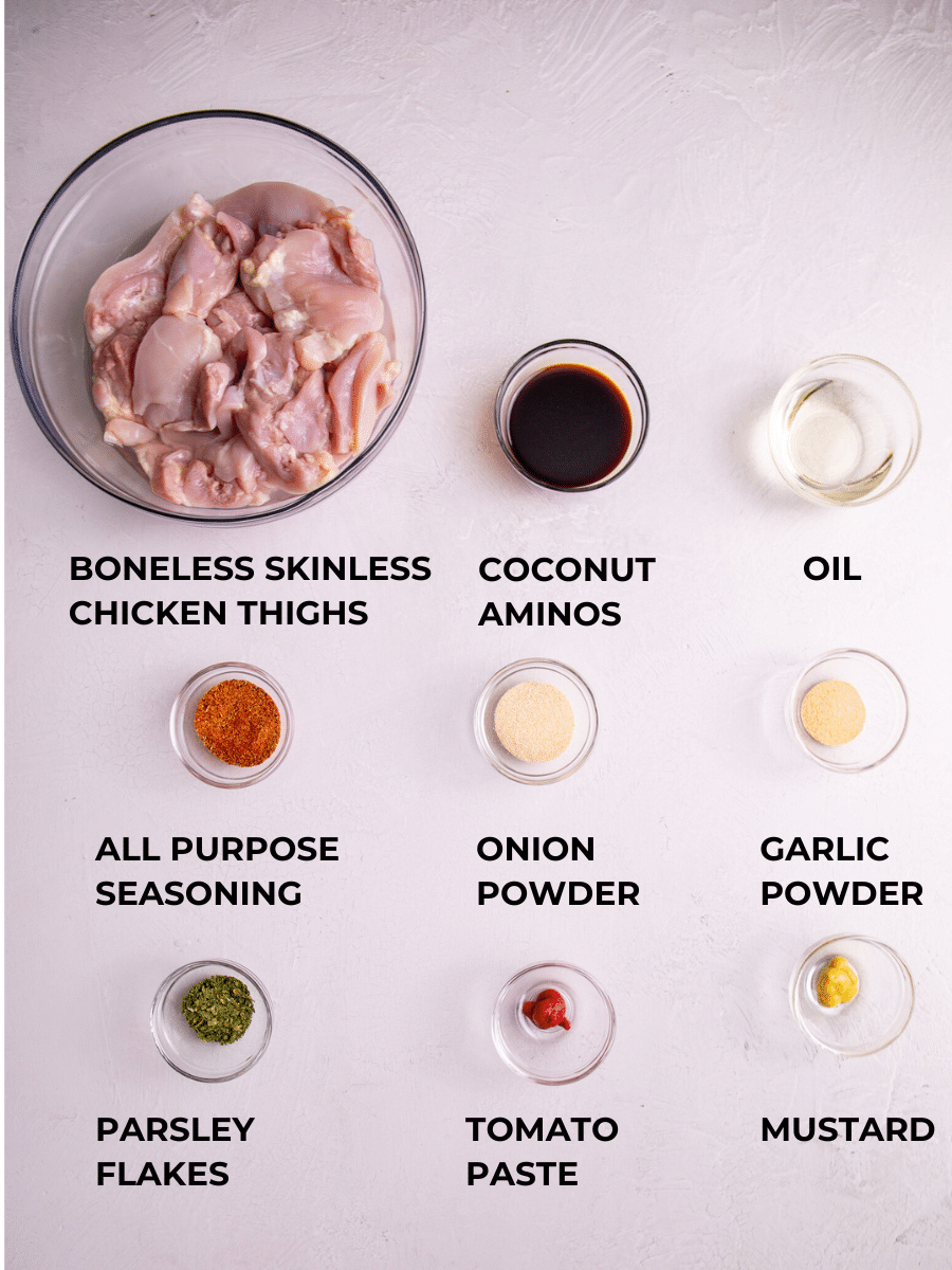 Ingredients for Caribbean Stew Chicken measured out and labeled.