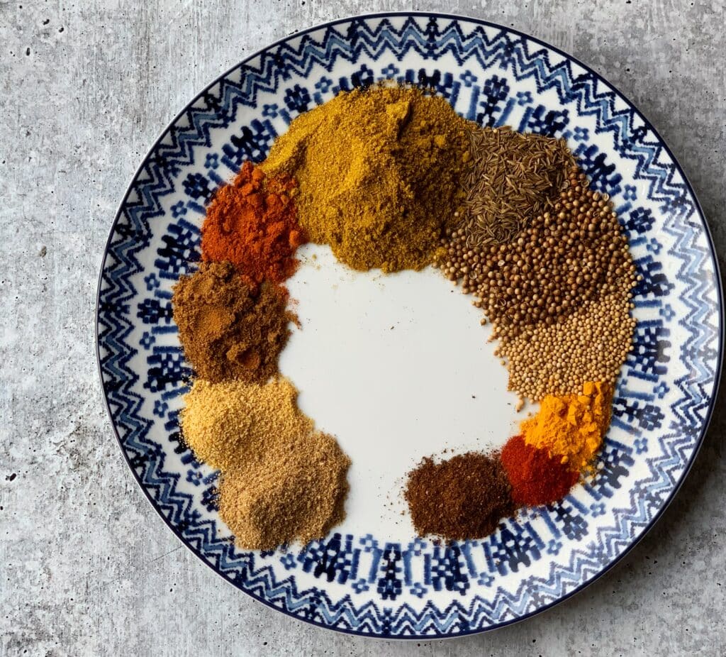 a plate full of spices for masala