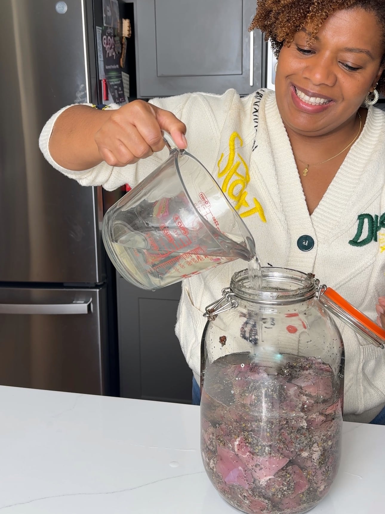 Althea Brown is adding vinegar to Guyanese garlic pork
