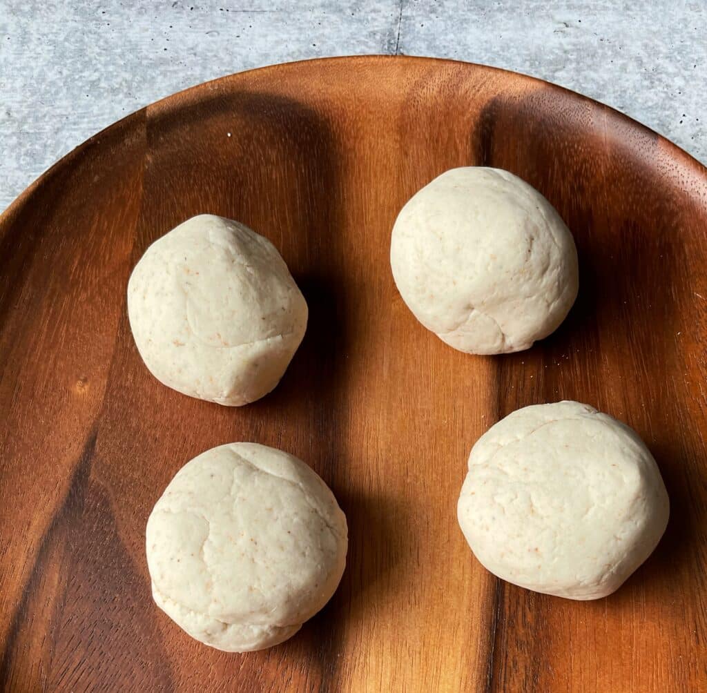 gluten free sada roti dough balls on a plate