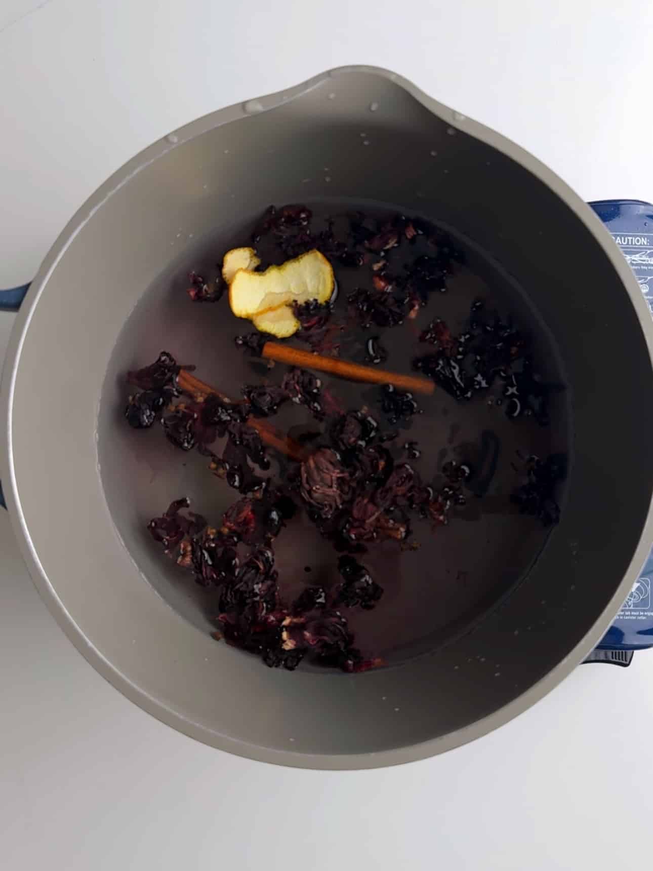 Ingredients for sorrel in a pot with water.