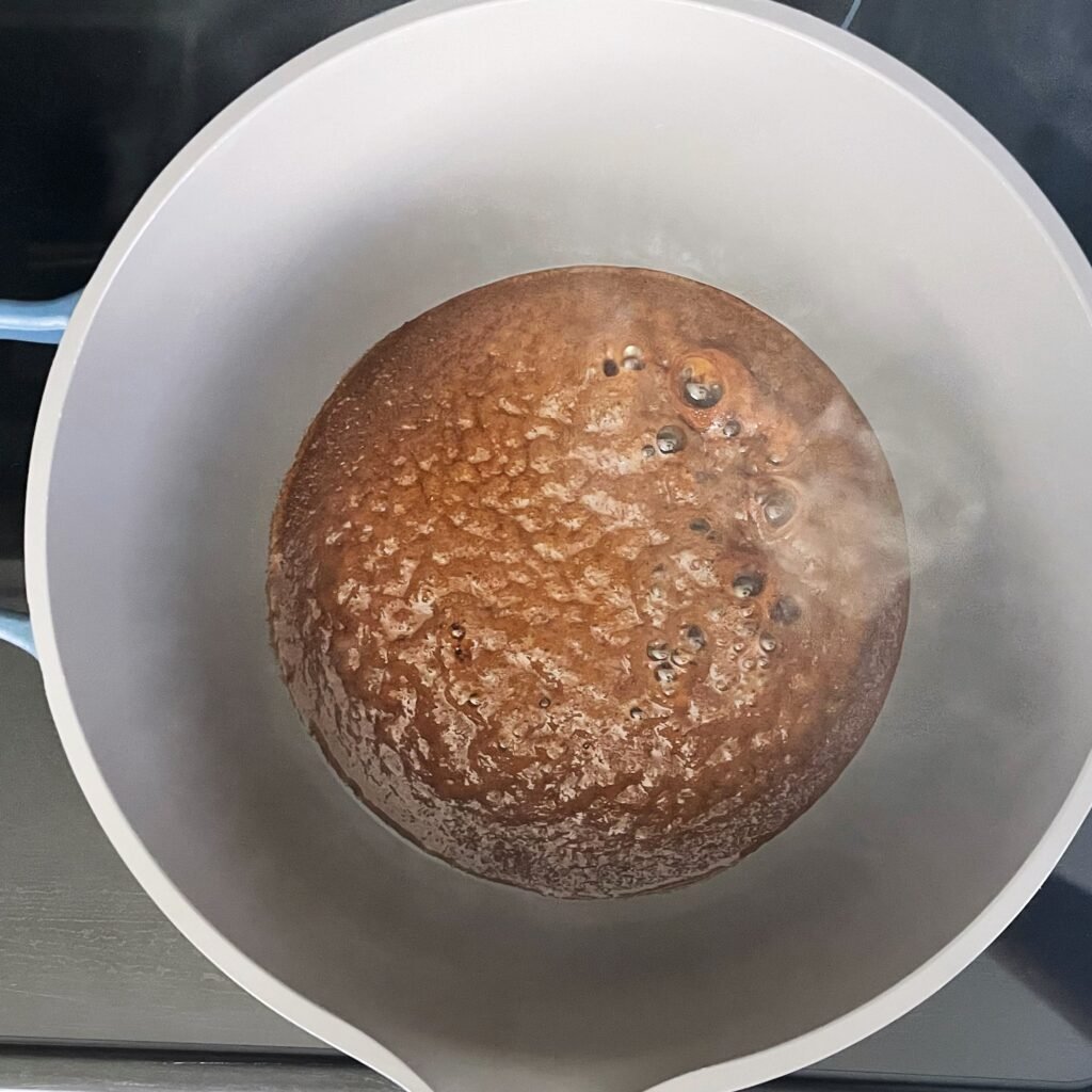 water added to sugar in the pot for browning sauce