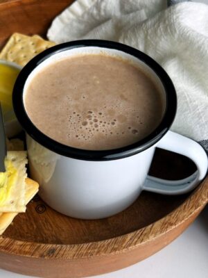 cocoa tea in a white enamel cup