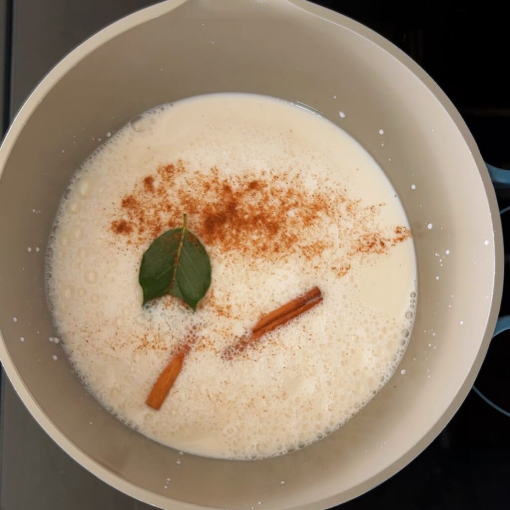 milk and spices in a pot